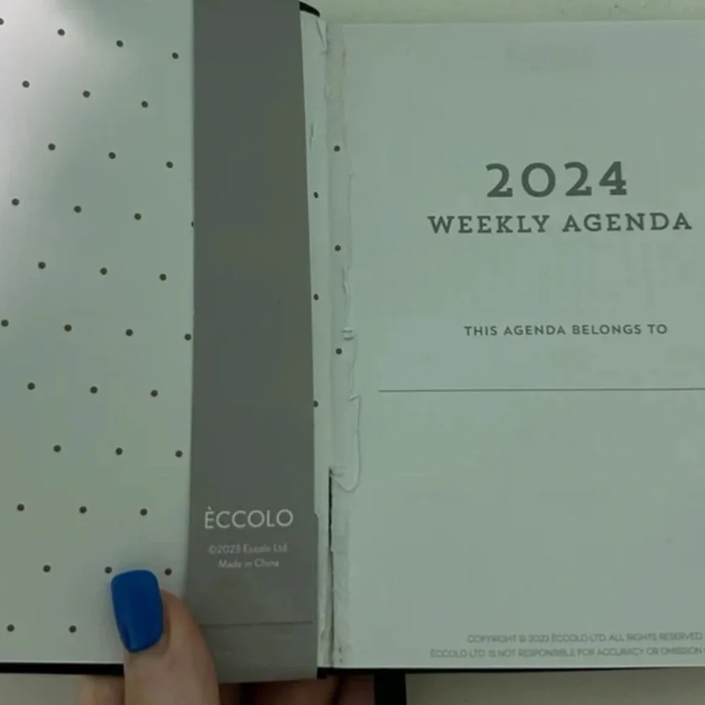 2024 planner front page ripped out as shown